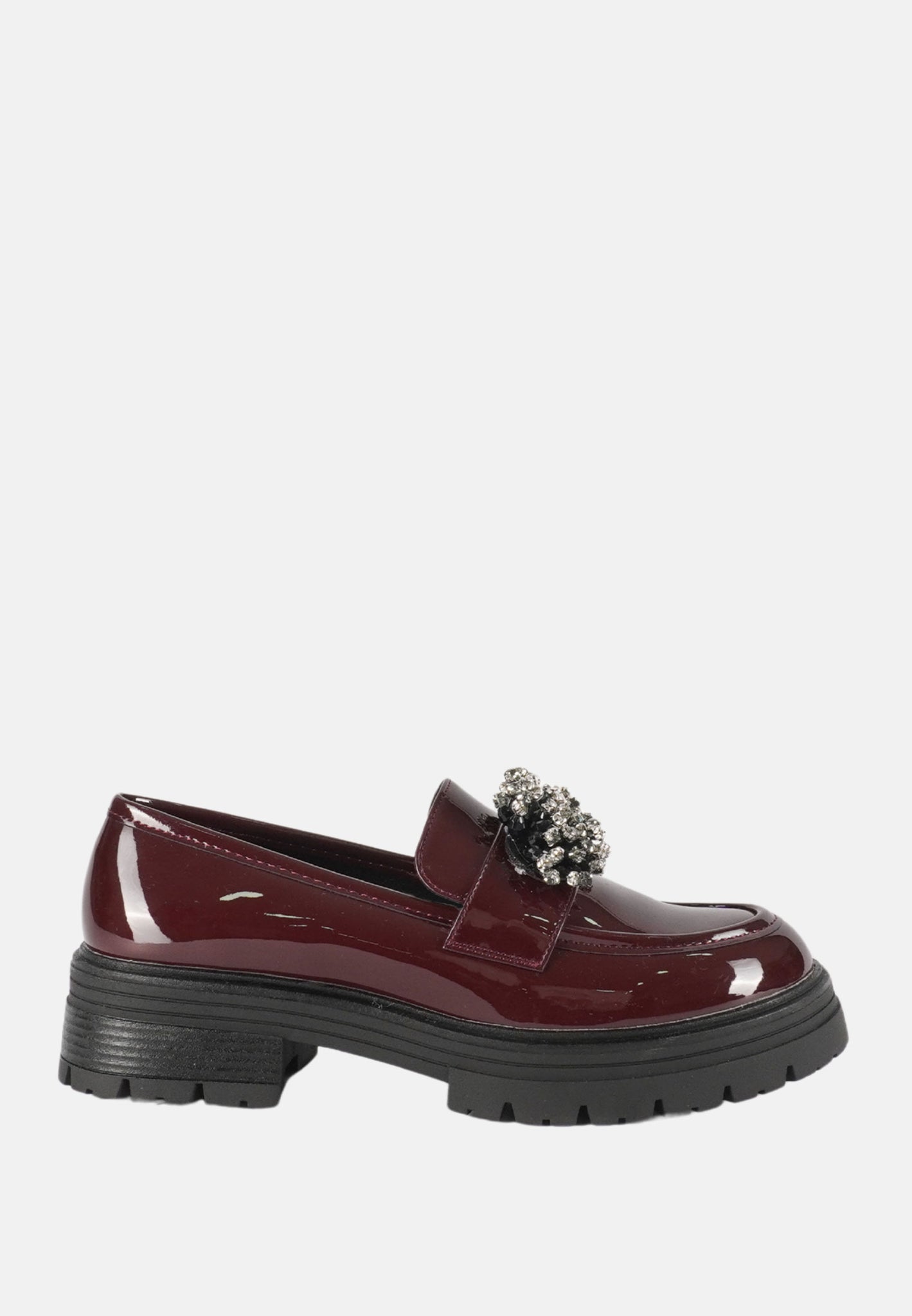 Mocassini lucidi con pon pon
