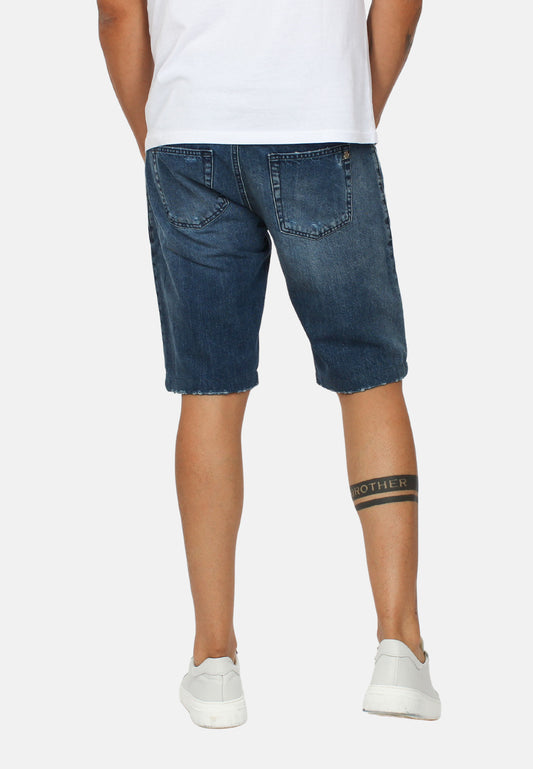 Bermuda shorts with superficial tears