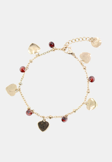 Bracelet with red crystals and rose gold hearts